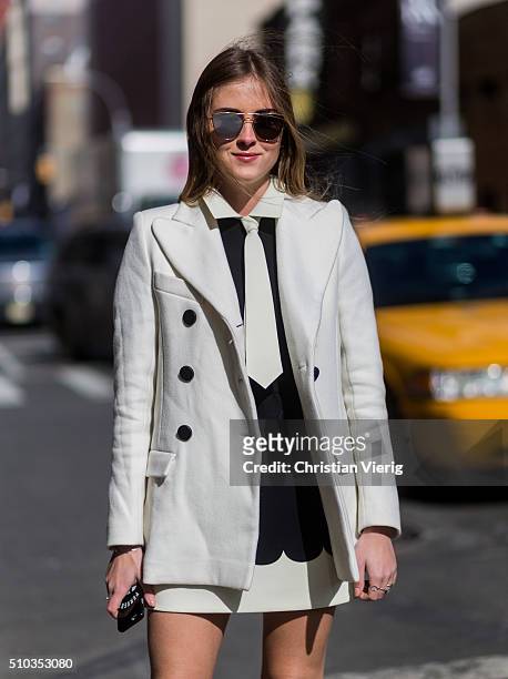 Valentina Ferragni is wearing golden heels and white blazer seen outside Rebecca Minkoff during New York Fashion Week: Women's Fall/Winter 2016 on...