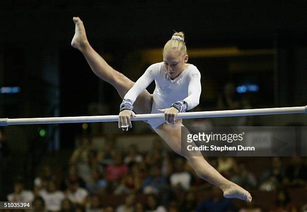 Courtney McCool competes on the uneven bars during the Women's finals of the U.S. Gymnastics Olympic Team Trials on June 27, 2004 at The Arrowhead...