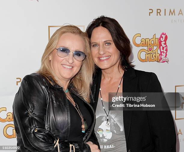 Melissa Etheridge and Linda Wallem attend the Primary Wave 10th Annual Pre-Grammy Party at The London West Hollywood on February 14, 2016 in West...