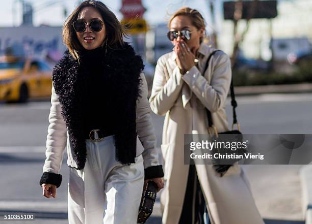 Dani Song and Aimee Song seen outside Tibi during New York Fashion Week: Women's Fall/Winter 2016 on February 13, 2016 in New York City.