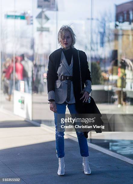 Linda Tol wearing a black wool coat and a black Louis Vuitton bag seen outside Tibi during New York Fashion Week: Women's Fall/Winter 2016 on...