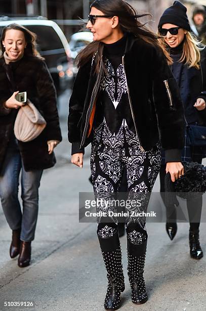 Giovanna Battaglia is seen outside the Jonathan Simkhai show wearing a black and white Alaia outfit during New York Fashion Week: Women's Fall/Winter...