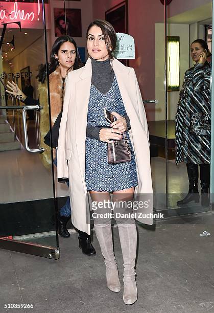 Camila Coelho is seen outside the DVF show wearing a DVF dress during New York Fashion Week: Women's Fall/Winter 2016 on February 14, 2016 in New...