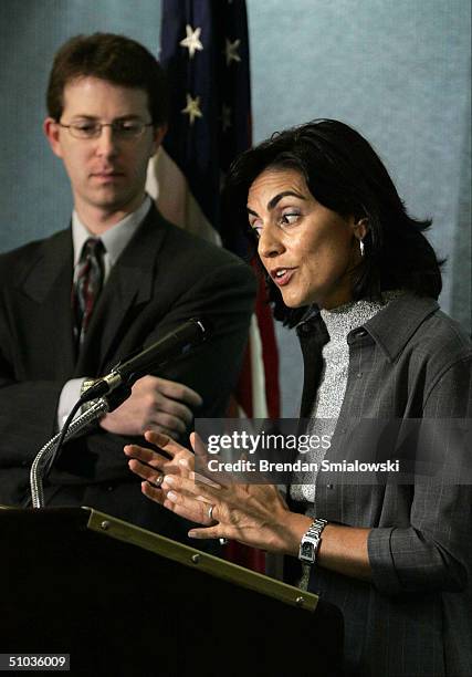 Former FBI translator and whistle-blower, Sibel Edmonds, speaks as her lawyer, Mark Zaid , stands nearby during a media conference at the National...