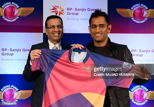 Industrialist and owner of the Indian Premier League's Rising Pune Supergiants cricket team Sanjiv Goenka and team captain Mahendra Singh Dhoni...