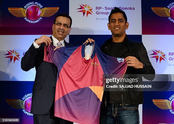 Industrialist and owner of the Indian Premier League's Rising Pune Supergiants cricket team Sanjiv Goenka and team captain Mahendra Singh Dhoni...