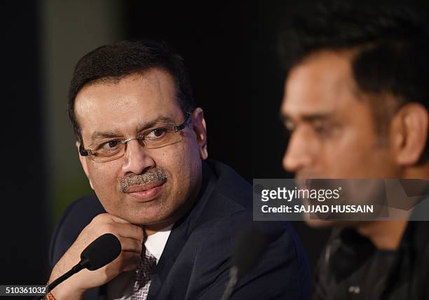 Industrialist and owner of the Indian Premier League's Rising Pune Supergiants cricket team Sanjiv Goenka and team captain Mahendra Singh Dhoni speak...