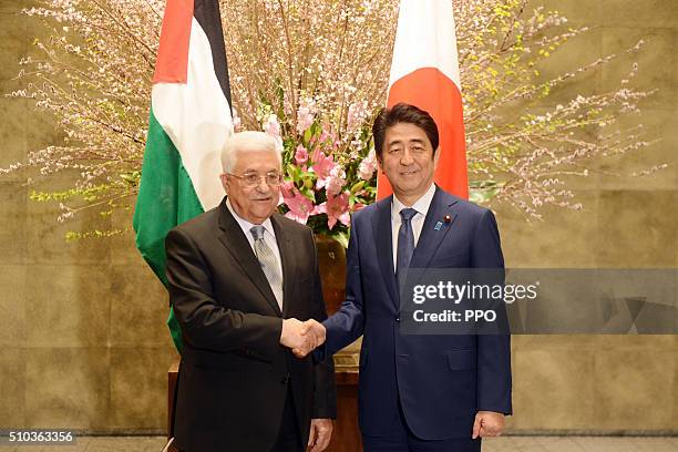 In this handout image supplied by the Palesinian President's Office , Palestinian president Mahmoud Abbas meets Japanese Prime Minister Shinzo Abe,...