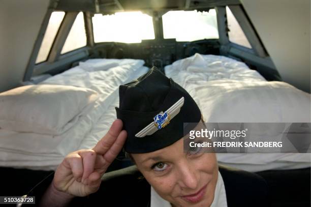 Local Manager Gisela Olsson gestures in the cockpit suite of the Jumbo Hostel, reportedly the worlds first hostel in an airplane, at Arlanda airport...