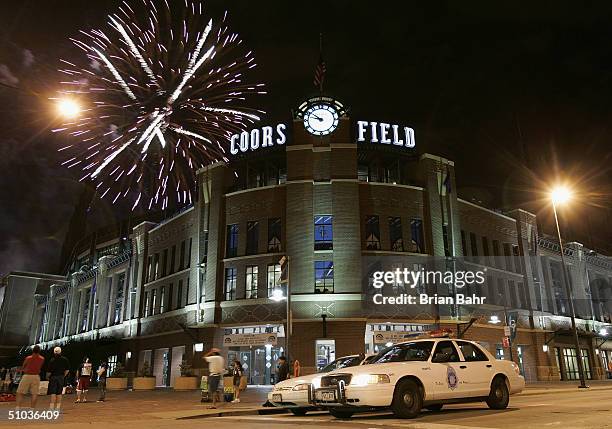 Fireworks explode over Coors Field after the interleague game between the Detroit Tigers and the Colorado Rockies on July 3, 2004 in Denver,...