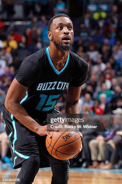 Kemba Walker of the Charlotte Hornets attempts a free throw shot against the Miami Heat on February 5, 2016 at Time Warner Cable Arena in Charlotte,...