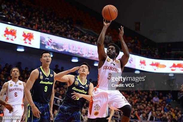 Eugene Jeter of Shandong Golden Stars shoots the ball against Ike Diogu of Guangdong Southern Tigers during the Chinese Basketball Association 15/16...