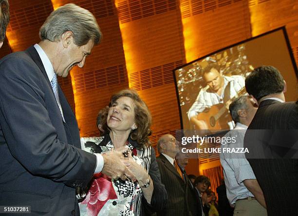 Democratic presidential candidate John Kerry and his wife Teresa Heinz Kerry listen to musician Dave Matthews at a Kerry/Edwards 2004 Victory concert...