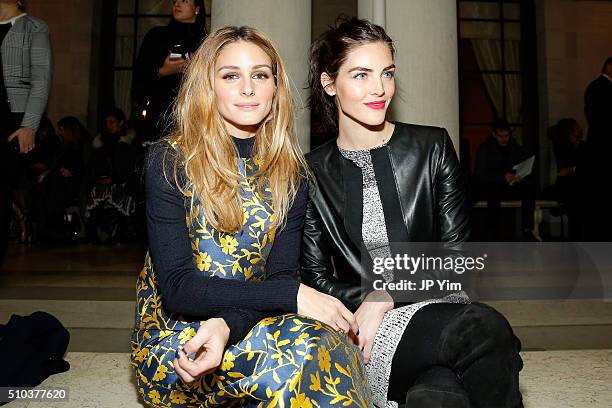 Olivia Palermo and model Hilary Rhoda attend the Carolina Herrera Fall 2016 fashion show during New York Fashion Week on February 15, 2016 in New...