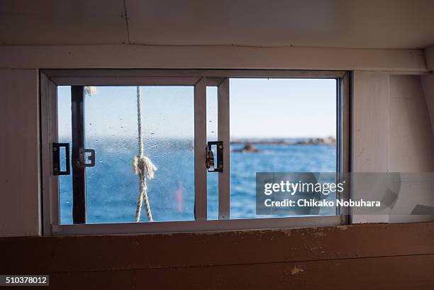 window in a fishing boat - chigasaki beach stock pictures, royalty-free photos & images