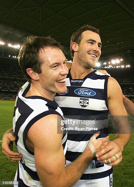 Brenton Sanderson and Steven King for the Cats celebrate after the round fifteen AFL match between The Collingwood Magpies and the Geelong Cats at...