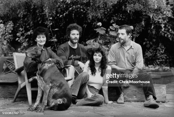 English singer-songwriter and musician Kate Bush with her mother, Hannah Daly, and her brothers Paddy and John at their home in East Wickham, London,...