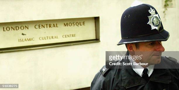 British police officer patrols outside of the London Central Mosque as the controversial Islamic cleric Yusuf Al-Qaradawi arrives to deliver the...