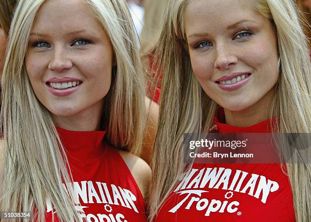 The Hawaiian Tropic twins pose before the start of the Le Mans 24 Hour race at the Circuit des 24 Hours du Mans on June 13, 2004 in Le Mans, France.