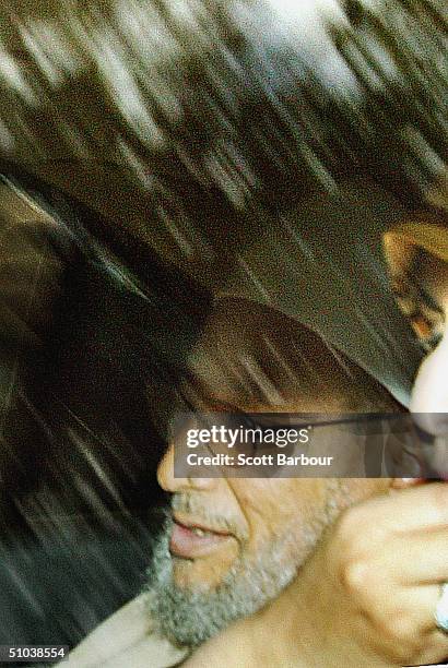 Controversial Islamic cleric Yusuf Al-Qaradawi leaves the London Central Mosque after delivering the Friday sermon on July 9, 2004 in London,...