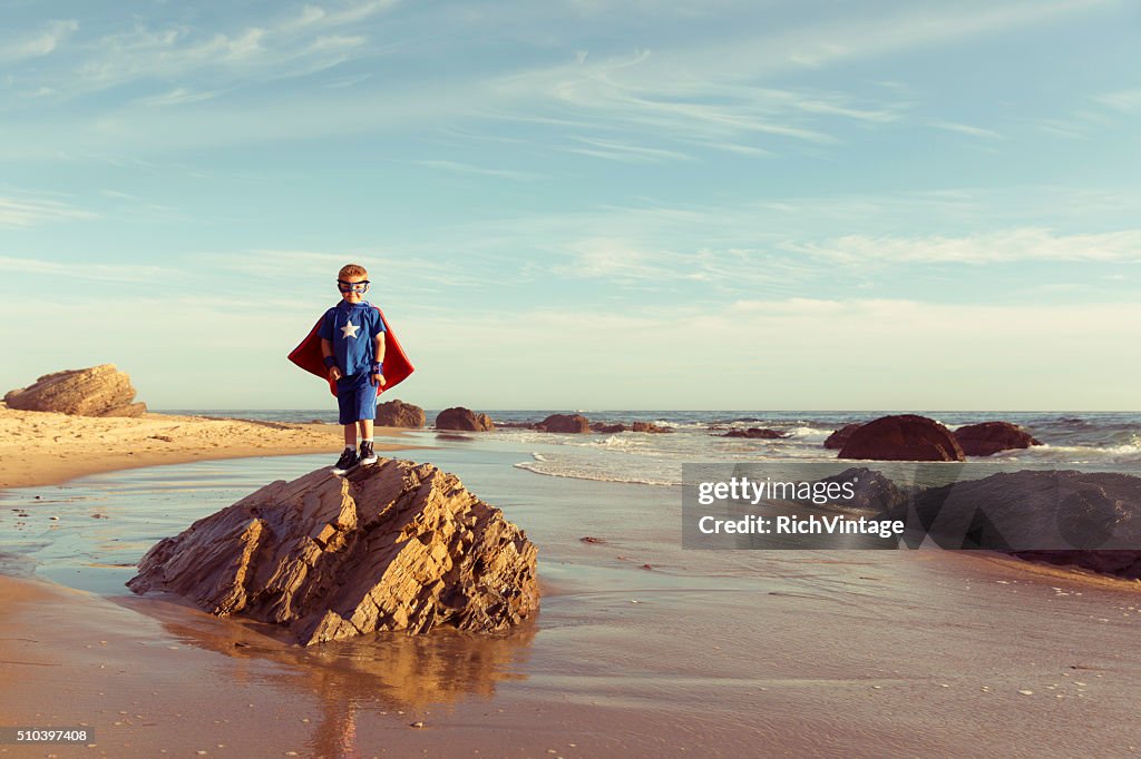 Young Boy dressed as Superhero on California Beach