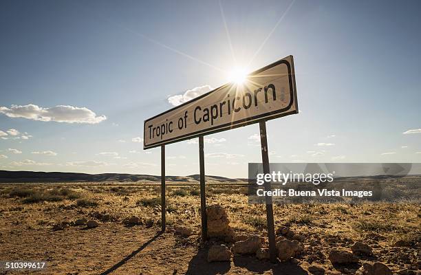 tropic of capricorn latitude crossing sign. - a361 stock pictures, royalty-free photos & images