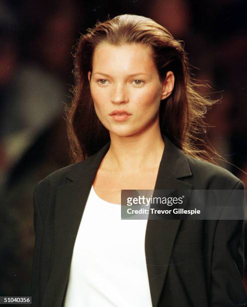 Model Kate Moss Walks The Runway At The Calvin Klein Spring Fashion Show In New York, September 18, 1998.