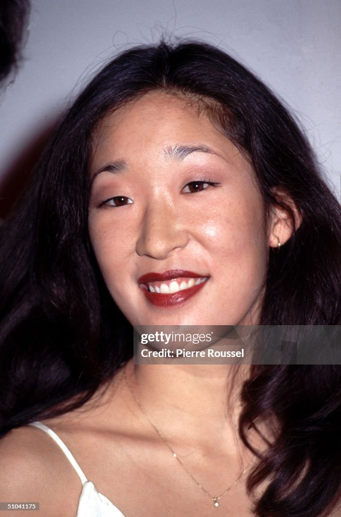 Actress Sandra Oh Poses For Photographers