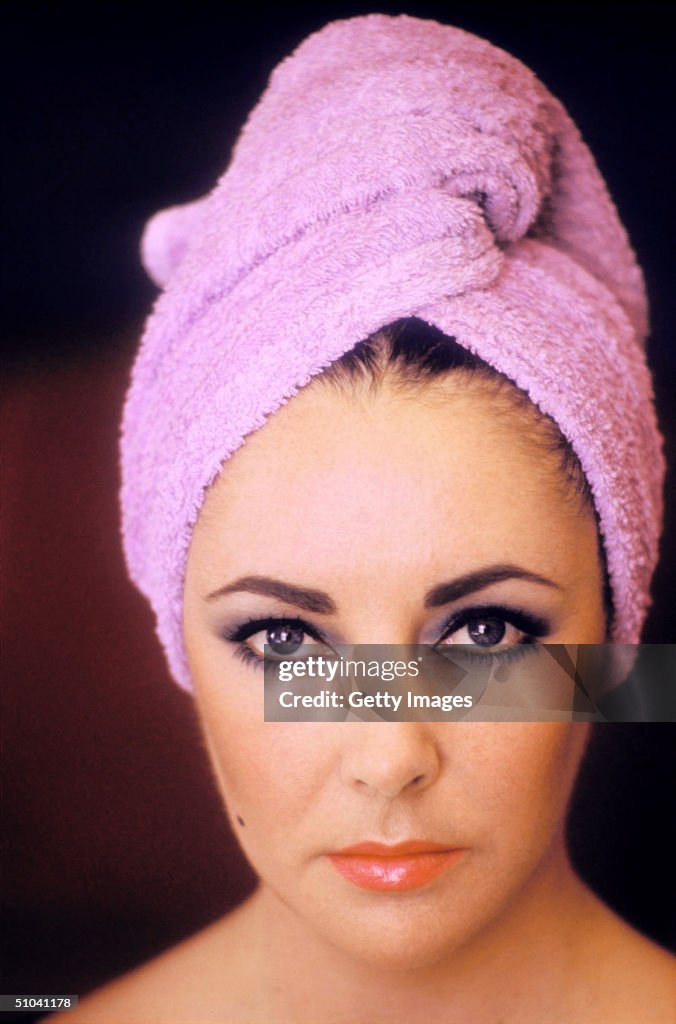 Actress Elizabeth Taylor Poses...