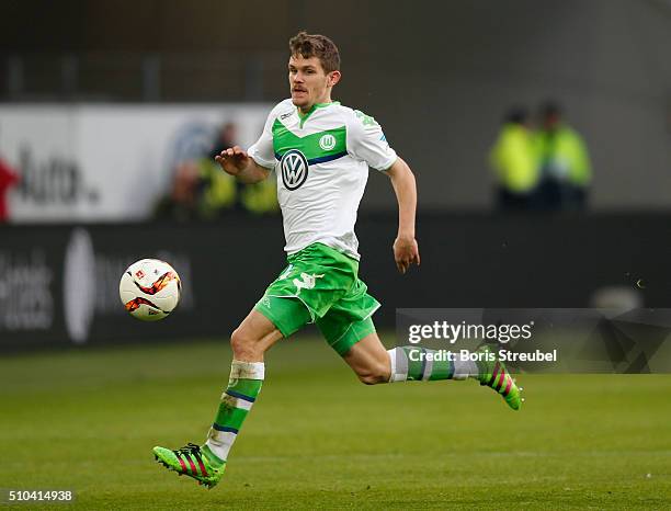 Sebastian Jung of Wolfsburg runs with the ball during the Bundesliga match between VfL Wolfsburg and FC Ingolstadt at Volkswagen Arena on February...