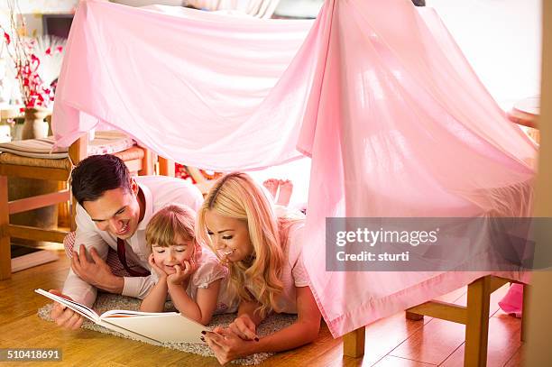 family storytime - kids fort stock pictures, royalty-free photos & images