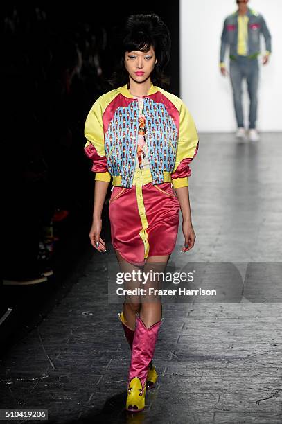 Model walks the runway wearing Jeremy Scott Fall 2016 during New York Fashion Week: The Shows at The Arc, Skylight at Moynihan Station on February...