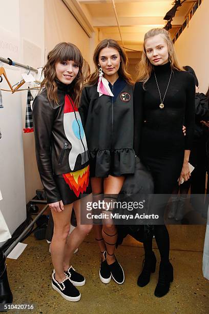 Fashion designer Anna Karenina, Alina Baikova and model Magdalena Frackowiak pose backstage at the Anna K fashion show during Fall 2016 MADE Fashion...