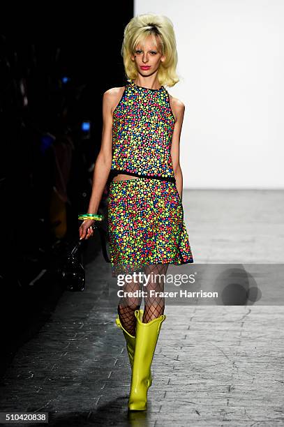 Model walks the runway wearing Jeremy Scott Fall 2016 during New York Fashion Week: The Shows at The Arc, Skylight at Moynihan Station on February...