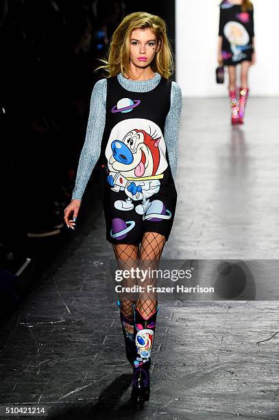 Model walks the runway wearing Jeremy Scott Fall 2016 during New York Fashion Week: The Shows at The Arc, Skylight at Moynihan Station on February...