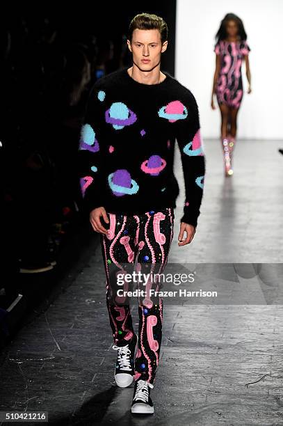 Model walks the runway wearing Jeremy Scott Fall 2016 during New York Fashion Week: The Shows at The Arc, Skylight at Moynihan Station on February...