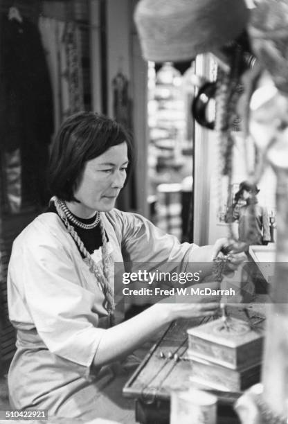 Jewelery designer Mary Rattray Kanovitz at work in her shop, Queen of Diamonds , November 1, 1964.