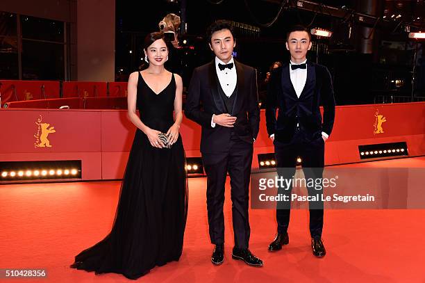 Actors Xin Zhi Lei, Qin Hao and Wu Lipeng attend the 'Crosscurrent' premiere during the 66th Berlinale International Film Festival Berlin at...