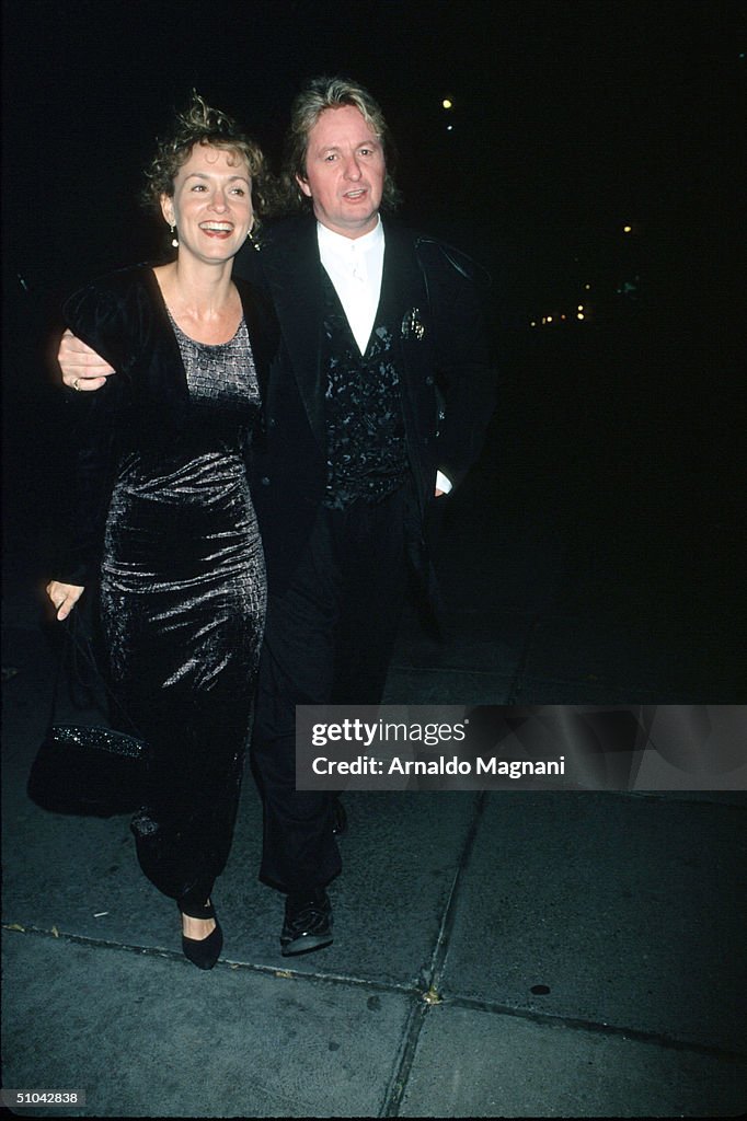 Singer Jon Anderson Walks With His Wife...