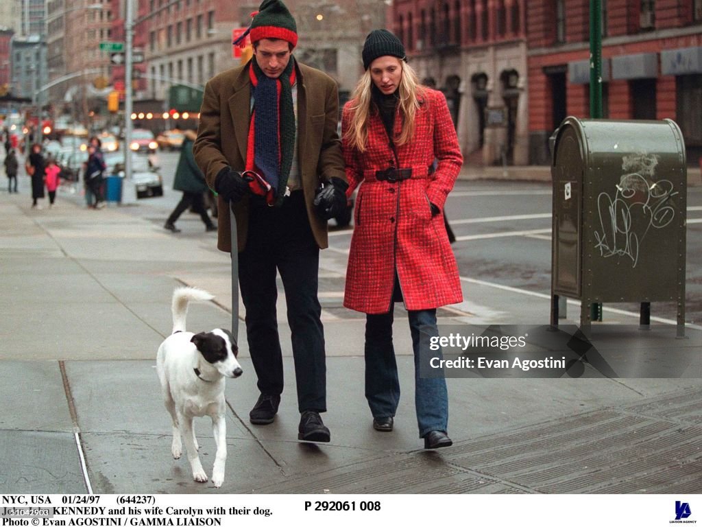 John F. Kennedy Jr. Walks with Wife