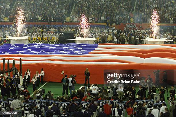 Faith Hill Performs The National Anthem Before The Start Of Super Bowl Xxxiv Between The Tennessee Titans And The St Louis Rams At The Georgia Dome...