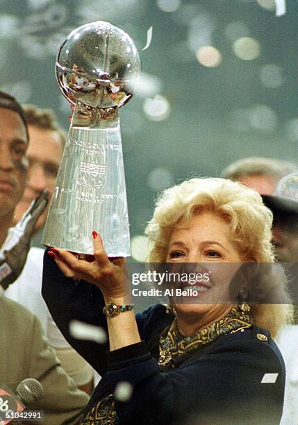 Owner Georgia Frontiere Of The St Louis Rams Lifts The Vince Lombardi Trophy After Super Bowl Xxxiv Between The St Louis Rams And Tennessee Titans At...