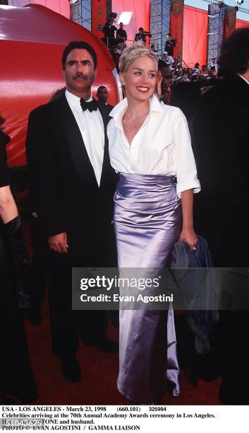 Usa - Los Angeles - March 23, 1998 Celebrities Arriving At The 70Th Annual Academy Awards Ceremony In Los Angeles. Here, Sharon Stone And Husband.