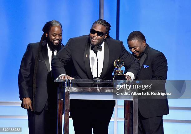 Misuicians Peter 'Peetah' Morgan, Roy 'Gramps' Morgan and Nakamyah 'Lukes' Morgan of Morgan Heritage accept award for Best Reggae Album onstage...