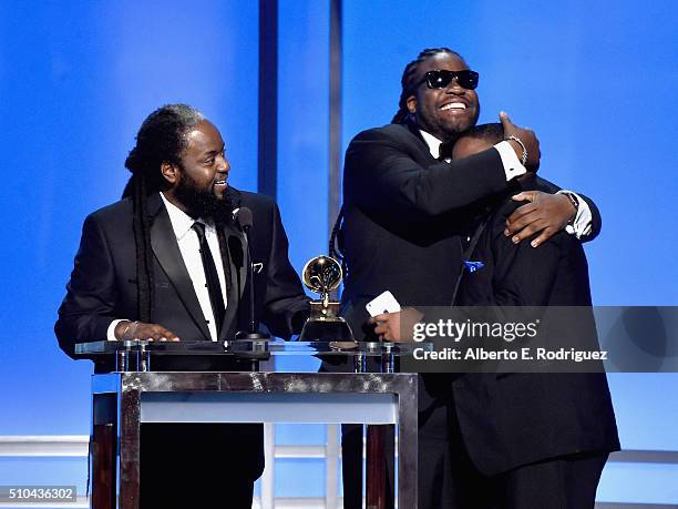 Misuicians Peter 'Peetah' Morgan, Roy 'Gramps' Morgan and Nakamyah 'Lukes' Morgan of Morgan Heritage accept award for Best Reggae Album onstage...