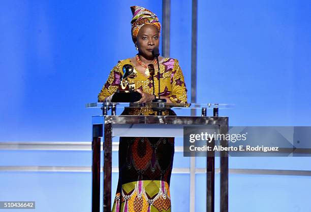 Singer/songwriter Angelique Kidjo accepts an award onstage during the GRAMMY Pre-Telecast at The 58th GRAMMY Awards at Microsoft Theater on February...