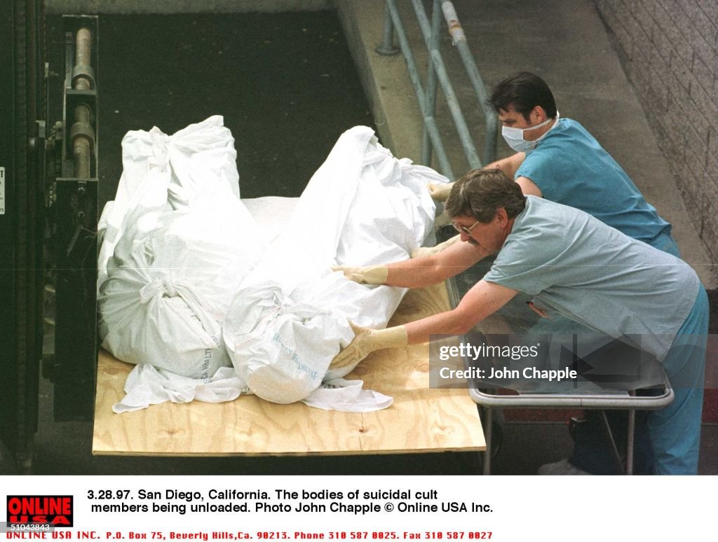 The Bodies Of The Mass Suicide Being Unloaded