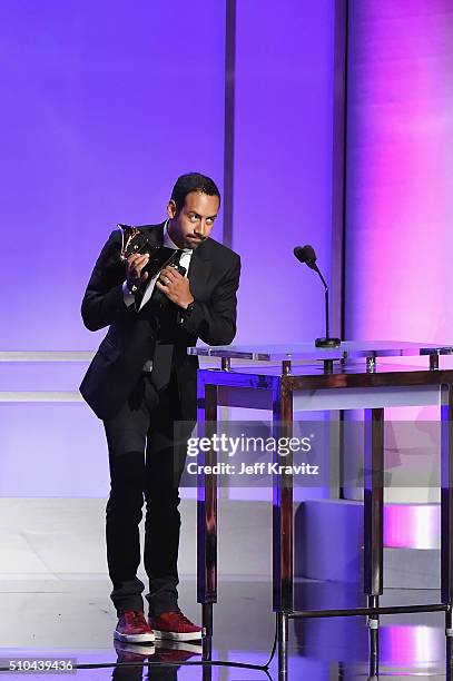 Musician/composer Antonio Sanchez accepts the award for Best Score Soundtrack for Visual Media for 'Birdman' onstage during The 58th GRAMMY Premiere...