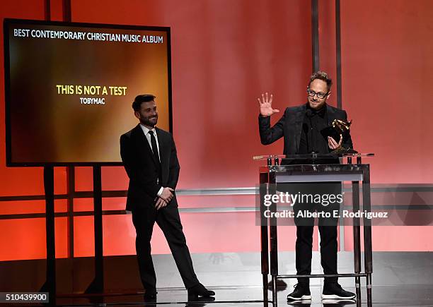 Recording artist TobyMac, winner of Best Contemporary Christian Music Album for 'This Is Not A Test', accepts award onstage during the GRAMMY...