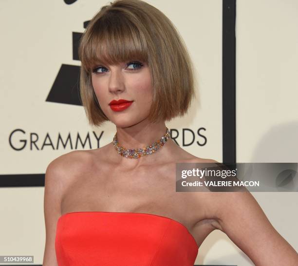Singer Taylor Swift arrives on the red carpet during the 58th Annual Grammy Music Awards in Los Angeles February 15, 2016. AFP PHOTO/ Valerie MACON
